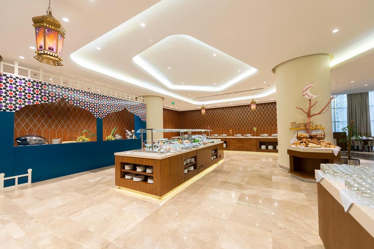 Holiday Suites Al Azizia Mekka Eksteriør billede The hotel's restaurant