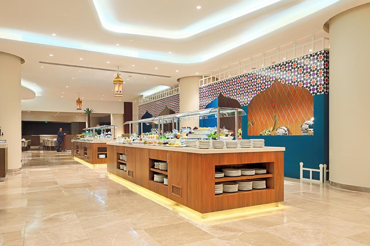 Holiday Suites Al Azizia Mekka Eksteriør billede The hotel's restaurant